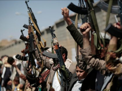 FILE -- In this Sunday, Oct. 2, 2016 file photo, tribesmen loyal to Houthi rebels hold their weapons as they chant slogans during a gathering aimed at mobilizing more fighters into battlefronts in several Yemeni cities, in Sanaa, Yemen. Yemen's civil war is threatening to further entangle the United States …