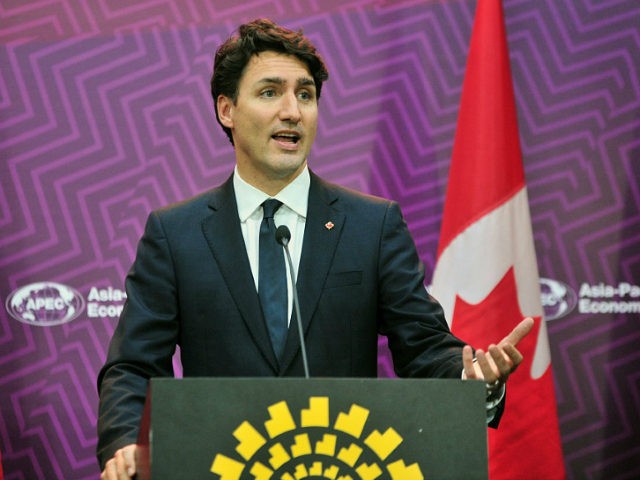 Canada's Prime Minister Justin Trudeau speaks during a press conference on the last day of the Asia-Pacific Economic Cooperation (APEC) Summit in Lima on November 20, 2016. Asia-Pacific leaders vowed on November 20 to fight protectionism at the close of a summit upended by US President-elect Donald Trump's shock victory …