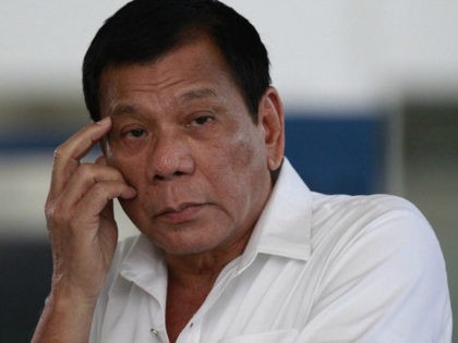 Philippine President Rodrigo Duterte listens to a question from reporters at Manila's Inte