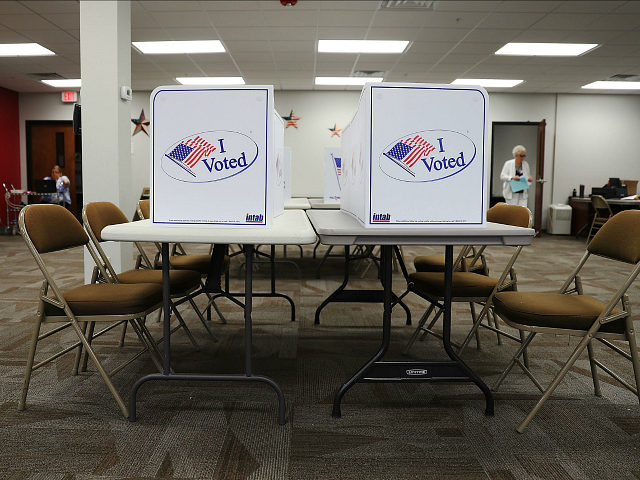 TAMPA, FL - OCTOBER 24: Voting booths are ready for voters at an early voting site in the Supervisor of Elections office on October 24, 2016 in Bradenton, Florida. Today early general election voting started in the state of Florida and ends on either Nov 5 or Nov 6th. (Photo …