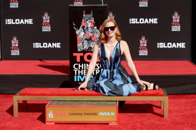 Actress Jessica Chastain poses for a photo during her hand and footprint ceremony at TCL C