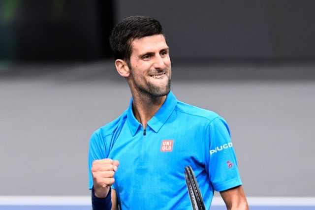 Serbia's Novak Djokovic celebrates after winning his third round tennis match against Bulg