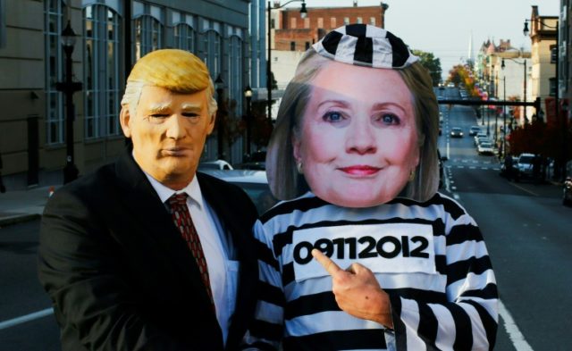 Supporters of Republican presidential nominee Donald Trump dressed as US Democratic presid
