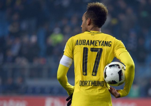 Dortmund's Pierre-Emerick Aubameyang holds the ball after scoring four times against botto