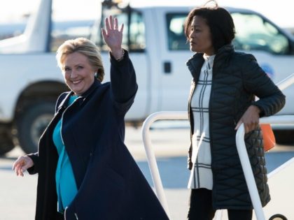 Democratic presidential nominee Hillary Clinton (L) arrives at Cleveland Burke Lakefront A