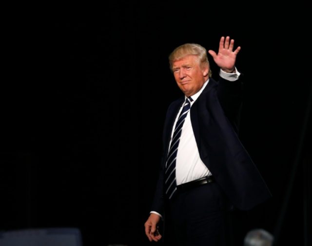 US Republican presidential candidate Donald Trump exits his final rally of the GOP 2016 p