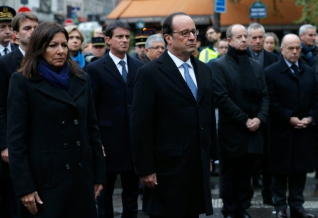 French President Francois Hollande (C), Paris Mayor Anne Hidalgo (L), Prime Minister Manue