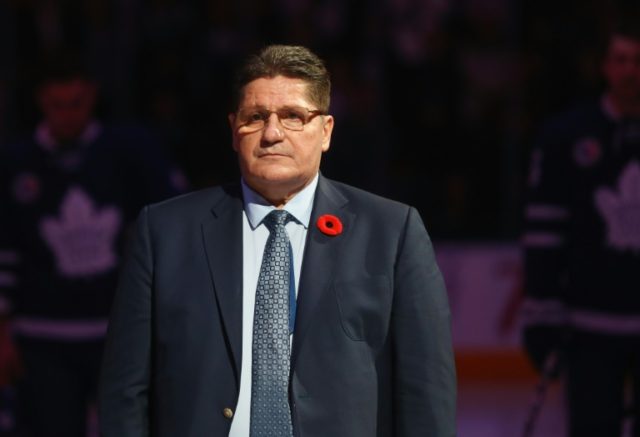 Sergei Makarov is honored for his induction into the Hockey Hall of Fame prior to the game