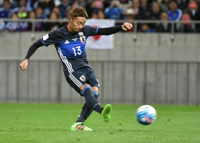 Japan's Hiroshi Kiyotake puts Japan ahead from the penalty spot in their World Cup qualifi