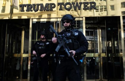 New York Police Department officers guard the main entrance of the Trump Tower on November 14, 2016
