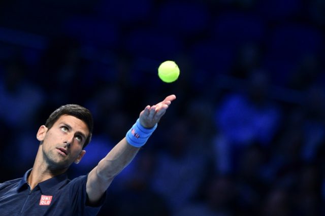 Serbia's Novak Djokovic serves to Belgium's David Goffin during their group match at the A
