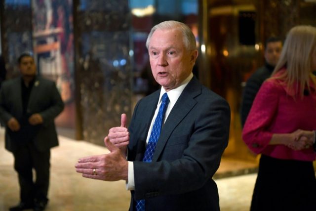 US Senator Jeff Sessions talks to the media at Trump Tower in New York on November 17, 201