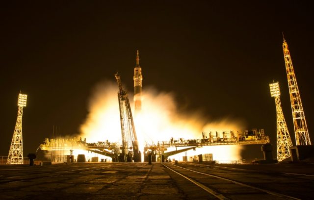 The Soyuz MS-03 spacecraft is seen launching from the Baikonur Cosmodrome with Expedition
