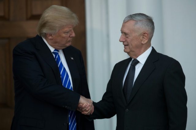 Donald Trump shakes hands with retired United States Marine Corps general James Mattis aft