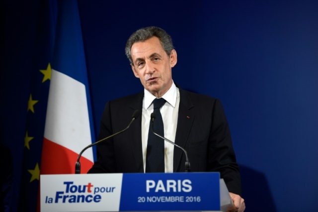 Former French president Nicolas Sarkozy delivers a speech to concede defeat in the first r