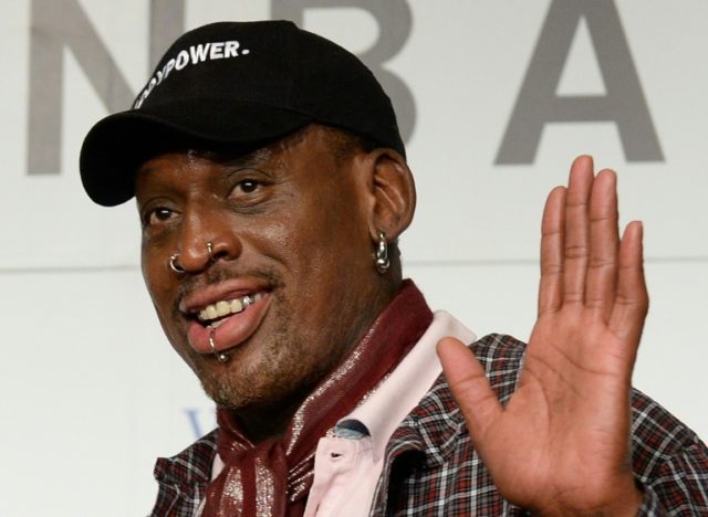 Former NBA star Dennis Rodman, seen in 2013, will be arraigned in January for misdemeanor