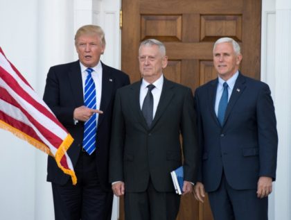 US President-elect Doanld Trump poses for a photo with MUS Marines General (Ret.) James Mattis and Vice President-elect Mike Pence on the steps of the clubhouse at Trump National Golf Club in Bedminster, New Jersey in November 19, 2016