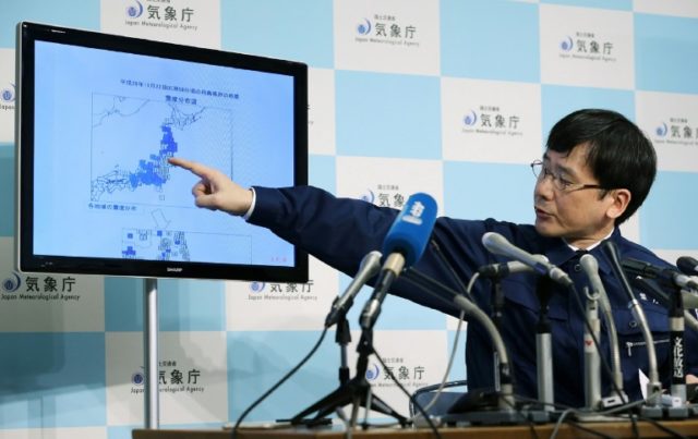 Japan's Meteorological Agency official Koji Nakamura gives a briefing following a 6.9-magn