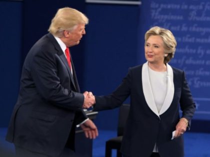 Hillary Clinton (right) and Donald Trump shake hands at the end of the second presidential