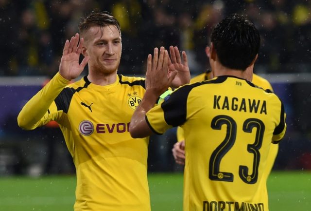 Dortmund's striker Marco Reus (L) and midfielder Shinji Kagawa celebrate during a Champion