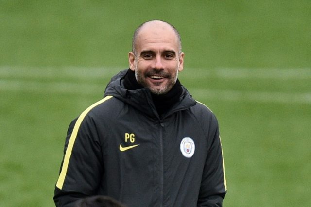 Manchester City's Pep Guardiola attends a training session at the City Football Academy in