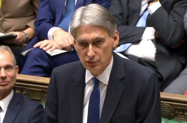 Philip Hammond says British economic growth will slow sharply next year
