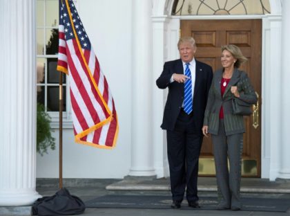 US President-elect Donald Trump (L) has chosen Betsy DeVos, pictured on November 19, 2016, to be Education Secretary