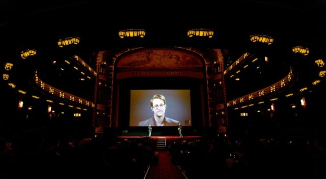 US whistleblower Edward Snowden talks to the audience and answers questions through a live