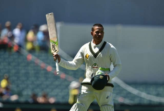 Australian batsman Usman Khawaja acknowledges the crowd after being dismissed on the third