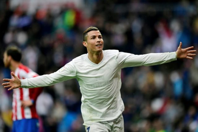 Real Madrid's Portuguese forward Cristiano Ronaldo celebrates his second goal during the S