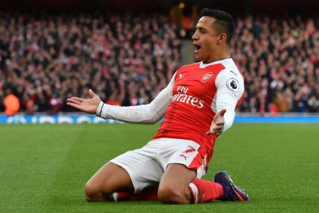 Arsenal's Alexis Sanchez celebrates scoring the opening goal in his team's 3-1 win over Bo