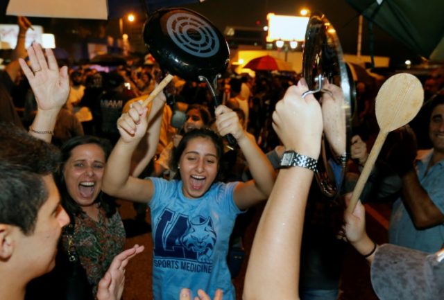 Cuban Americans celebrate news of Fidel Castro's death in Little Havana neighborhood of Mi