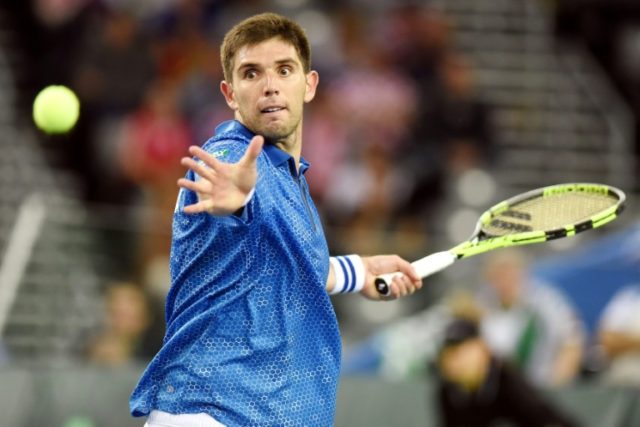 Argentina's tennis player Federico Delbonis returns ball to Croatia's Ivo Karlovic during
