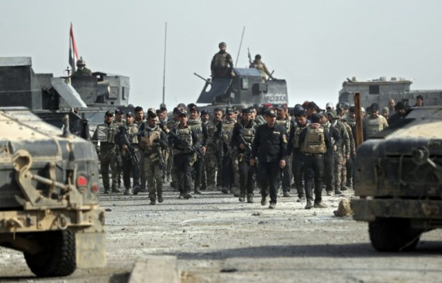 Iraqi Special Forces parade with Staff Lieutenant General Abdul Ghani Al-Asadi, commander