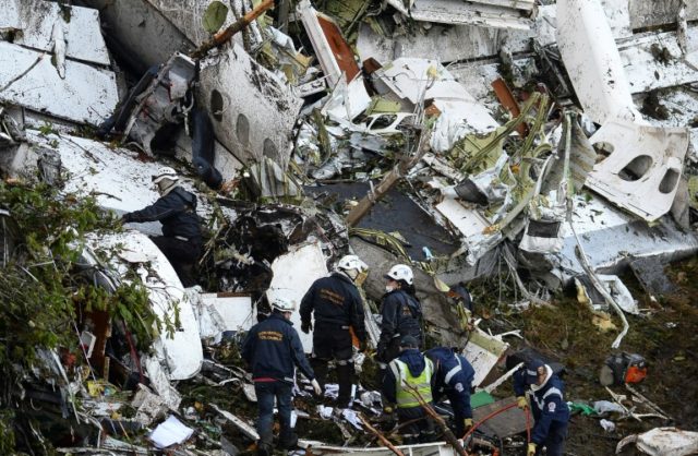 Rescue teams work in the recovery of the bodies of victims of the LAMIA airlines charter t