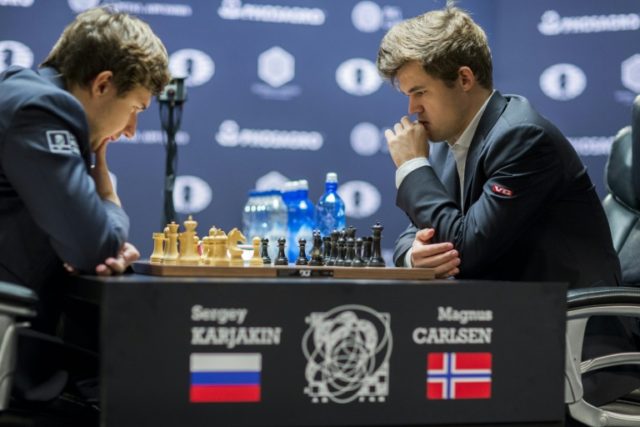 Magnus Carlsen, (R) Norwegian chess grandmaster and current World Chess Champion, and Serg