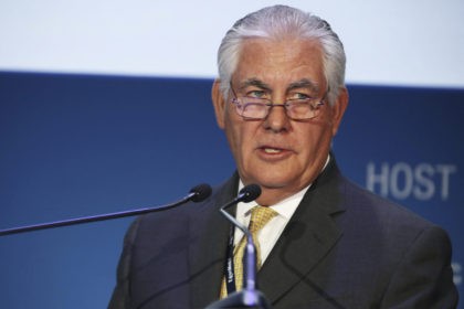 ExxonMobil CEO and chairman Rex W. Tillerson gives a speech at the annual Abu Dhabi International Petroleum Exhibition & Conference in Abu Dhabi, United Arab Emirates, on Monday, Nov. 7, 2016. Those attending the conference this week remain worried about low global oil prices. (AP Photo/Jon Gambrell)