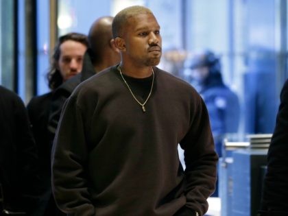 Kanye West enters Trump Tower in New York, Tuesday, Dec. 13, 2016.