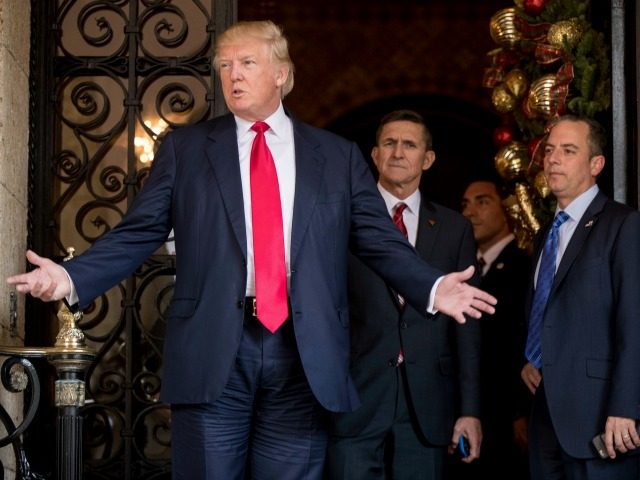 President-elect Donald Trump, left, accompanied by Trump Chief of Staff Reince Priebus, right, and Retired Gen. Michael Flynn, a senior adviser to Trump, center, speaks to members of the media at Mar-a-Lago, in Palm Beach, Fla., Wednesday, Dec. 21, 2016. ()