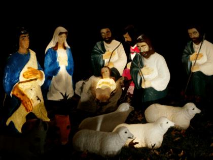 PASADENA, CA, DECEMBER 17: A life-size nativity scene glows in a yard on December 17, 2003 in Pasadena, California. Many of southern California's better holiday lights displays are in Pasadena. (Photo by David McNew/Getty Images)