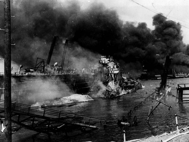 December 1941: The horror of destruction at the US Naval Base of Pearl Harbour (Pearl Harbor) which was attacked by the Japanese airforce on the 7th December 1941. The destroyer 'Shaw' is a tangled mess of wreckage but she was back in use one year later. (Photo by Fox Photos/Getty Images)