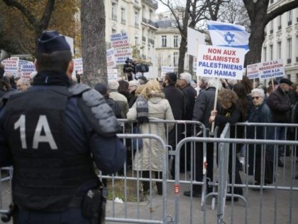 People take part in a pro-Israel demonstration urging the government not to recognise Palestine as a state, amid growing European frustration at the moribund Middle East peace process, on November 28, 2014 in front of the French National Assembly in Paris. AFP PHOTO / KENZO TRIBOUILLARD (Photo credit should read …