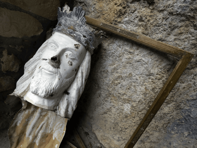 A broken statue depicting Jesus Christ is seen at the monastery of Saint Takla in the anci