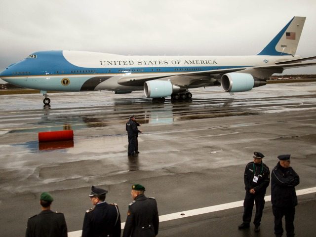 A red carped is rolled out for U.S. President Barack Obama boarding Air Force One as he de
