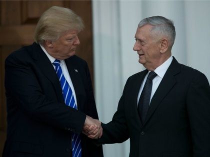 President-elect Donald Trump shakes hands with retired United States Marine Corps general James Mattis after their meeting at Trump International Golf Club, November 19, 2016 in Bedminster Township, New Jersey. Trump and his transition team are in the process of filling cabinet and other high level positions for the new …