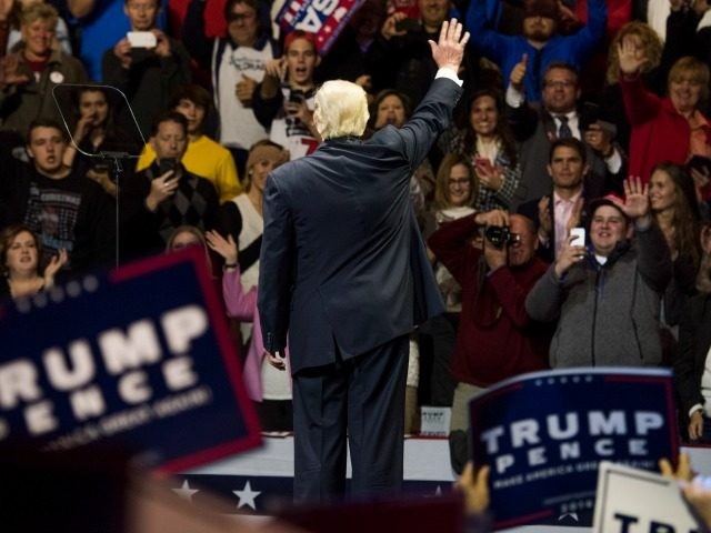 President-elect Donald Trump acknowledges the crowd after speaking at U.S. Bank Arena on D