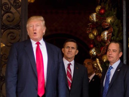 TOPSHOT - US President-elect Donald Trump (L) gestures as he speaks with Trump National Security Adviser Lt. General Michael Flynn (C) and Trump Chief of Staff Reince Priebus (R) at Mar-a-Lago in Palm Beach, Florida, where he is holding meetings on December 21, 2016. / AFP / JIM WATSON (Photo …