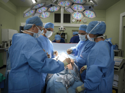 BIRMINGHAM, ENGLAND - MARCH 16: A surgeon and his theatre team perform key hole surgery to remove a gallbladder at at The Queen Elizabeth Hospital on March 16, 2010 in Birmingham, England. As the UK gears up for one of the most hotly contested general elections in recent history it …