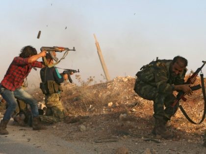 Fighters from the Free Syrian Army take part in a battle against the Islamic State (IS) group jihadists in the northern Syrian village of Yahmoul in the Marj Dabiq area north of the embattled city of Aleppo on October 10, 2016. Syria's main opposition group called for foreign allies to …