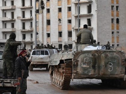 Syrian pro-government forces set up an outpost on December 2, 2016 in the Aleppo's eastern neighbourhood of Sakan al-Shababi after they retook from rebel fighters. President Bashar al-Assad's forces captured Aleppo's northeast this week and were focused on seizing Sheikh Saeed, a large district on the city's southeast edges. The …